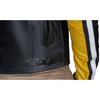 Corelli MG legacy black yellow white motorcycle racing leather jacket, genuine cowhide leather, removable CE protectors, removable inner lining, pockets, YKK zippers, close-up photo