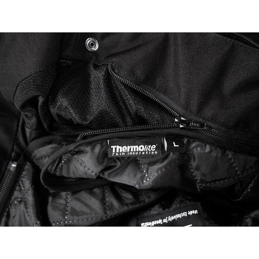 Corelli MG Storm black motorcycle racing textile pants, removable CE protectors, removable inner lining, mesh, cordura, YKK zippers, pockets, close-up photo